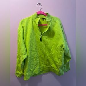 Bright green opening ceremony quarter zip